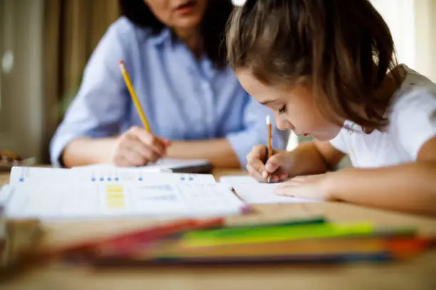 A parent and child learning together